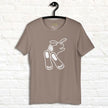 Beige Chill Bunny Line Art Tee hanging on a wall, showing the clean white rabbit line drawing.