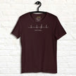 Lost in Music Line Art Tee in dark brown displayed on a hanger, featuring the heartbeat‑to‑treble‑clef design and ‘Lost in music…’ text in crisp white.