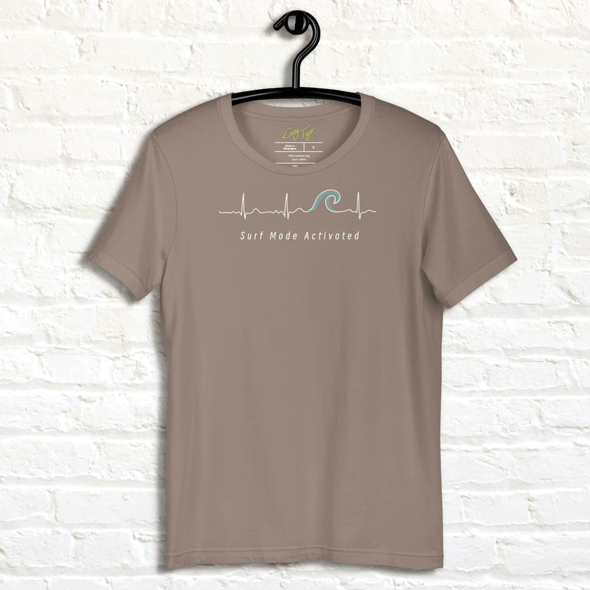 Taupe Surf Mode Activated Tee displayed on a hanger, featuring the heartbeat‑to‑wave line art and ‘Surf Mode Activated’ text in crisp white.