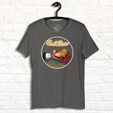Graphite grey Lazy Potato Tee displayed on a hanger, featuring the cute potato lounging on a couch with a TV remote and glowing ‘Couch Potato’ text.