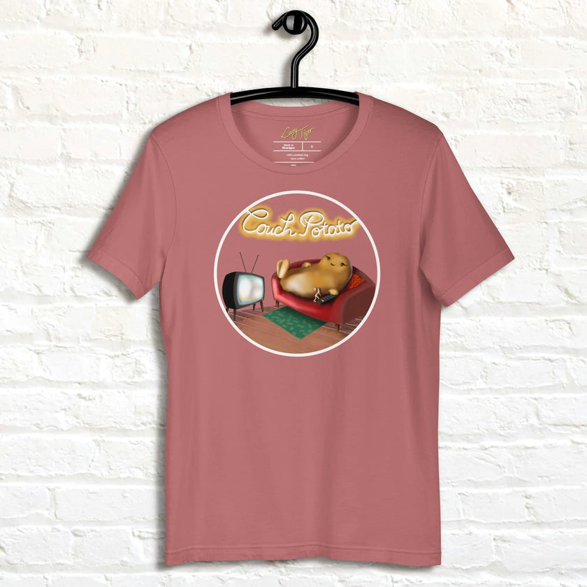 Rosewood Lazy Potato Tee hanging against a neutral background, featuring the funny potato lounging on a couch with neon ‘Couch Potato’ text.