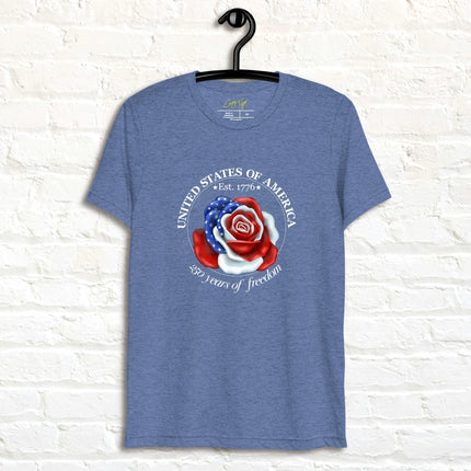 Vintage navy tee featuring a rose made of American flag colors with red, white, and blue petals and star details, shown on a hanger.