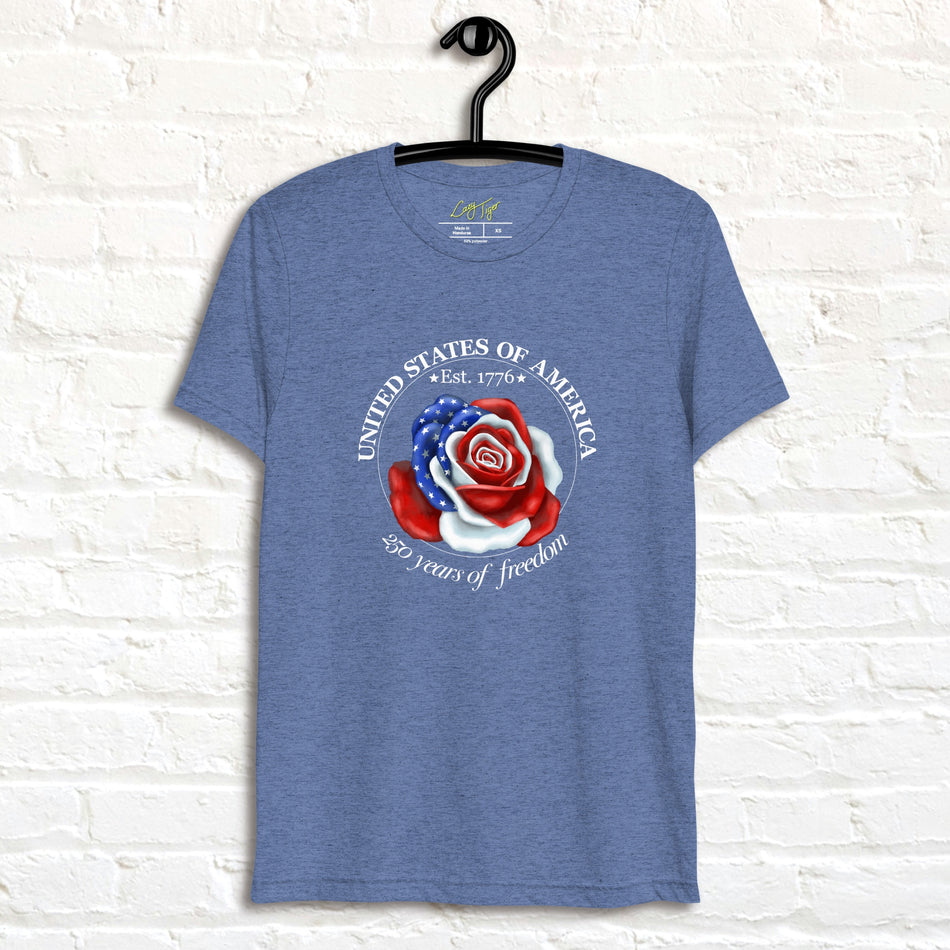 Vintage navy tee featuring a rose made of American flag colors with red, white, and blue petals and star details, shown on a hanger.
