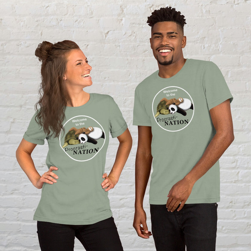 Couple wearing sage Procrasti‑NATION tees featuring sleepy animals, styled as a funny procrastination shirt and cute matching outfit idea.