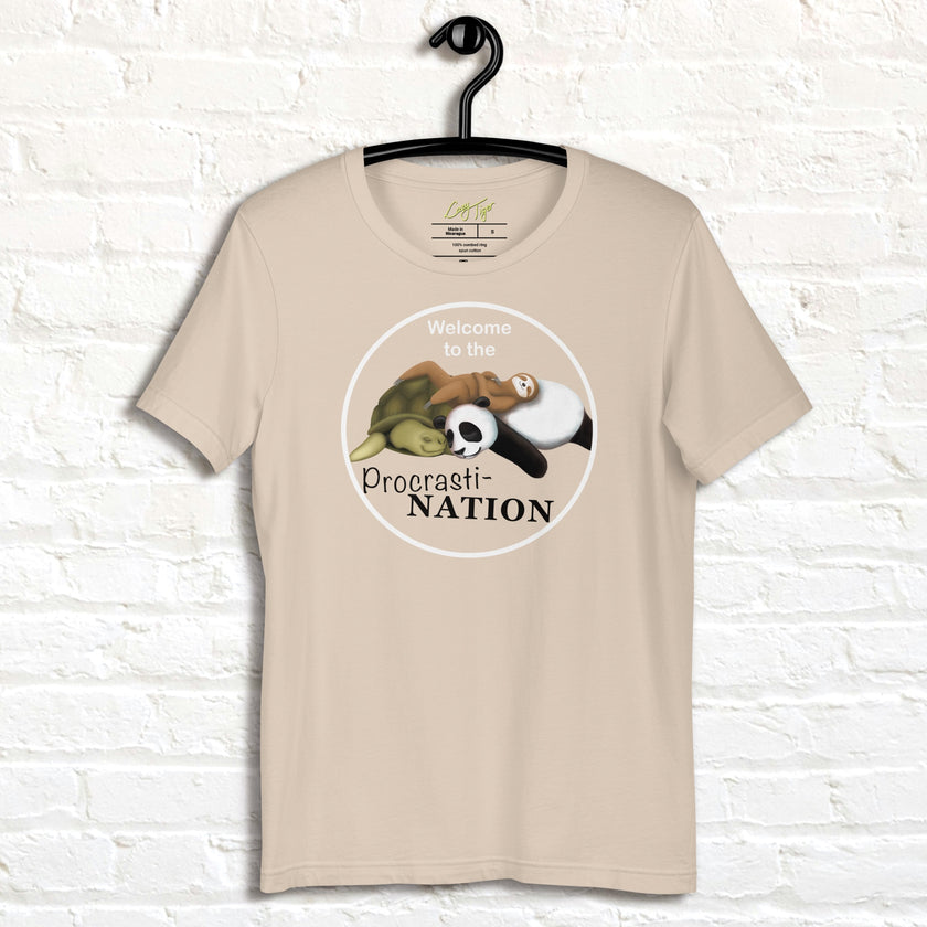 Cream Procrasti‑NATION shirt on hanger featuring sleepy animals artwork, ideal for soft aesthetic and lazy humor lovers.