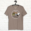 Taupe Procrasti‑NATION tee on hanger showing minimalist sleepy animals design, perfect for introverts and cozy aesthetic fans.