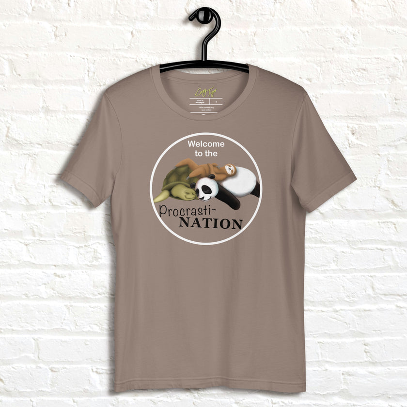 Taupe Procrasti‑NATION tee on hanger showing minimalist sleepy animals design, perfect for introverts and cozy aesthetic fans.