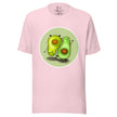 Light pink tee on a bodyform featuring two cute avocados, one standing and one upside down, facing opposite directions