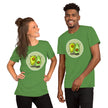 Model mockup of a matcha green tee with two cute avocados doing mirrored poses, one upright and one handstanding