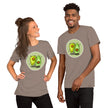 Model mockup of a taupe tee with two cute avocados doing mirrored poses, one upright and one handstanding