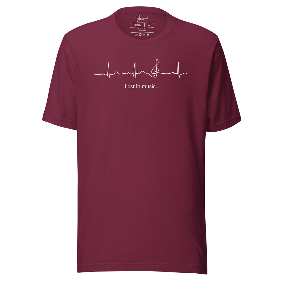 Burgundy Heartbeat Music Tee displayed on a bodyform showing the minimalist ECG‑inspired heartbeat line transitioning into a treble clef with ‘Lost in music…,’ printed in bright white on breathable cotton