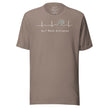 Taupe Heartbeat Surf Tee on a bodyform featuring the minimalist ECG‑inspired heartbeat line transitioning into a surf wave with the text ‘Surf Mode Activated,’ printed in clean contrasting white