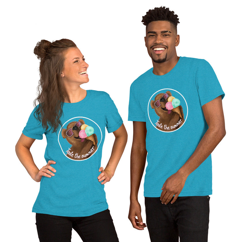 Model mockup of an aqua tee with a cute brown bear wearing white sunglasses with pink lenses, enjoying a triple‑scoop ice cream and smiling with delight