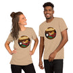 Model mockup of a beige tee with a cute couch potato illustration of a potato lying on a sofa watching TV