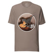 Taupe graphic tee featuring a cartoon dinosaur grabbing pizza, shown on a bodyform
