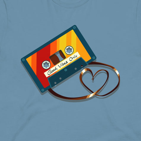 Thumbnail close-up of the Retro Vibes Cassette design on a denim blue tee, showing the bold vintage cassette with its tape forming a heart shape.