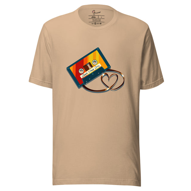 Beige tee featuring a colorful vintage cassette with tape shaped into a heart, shown on a bodyform