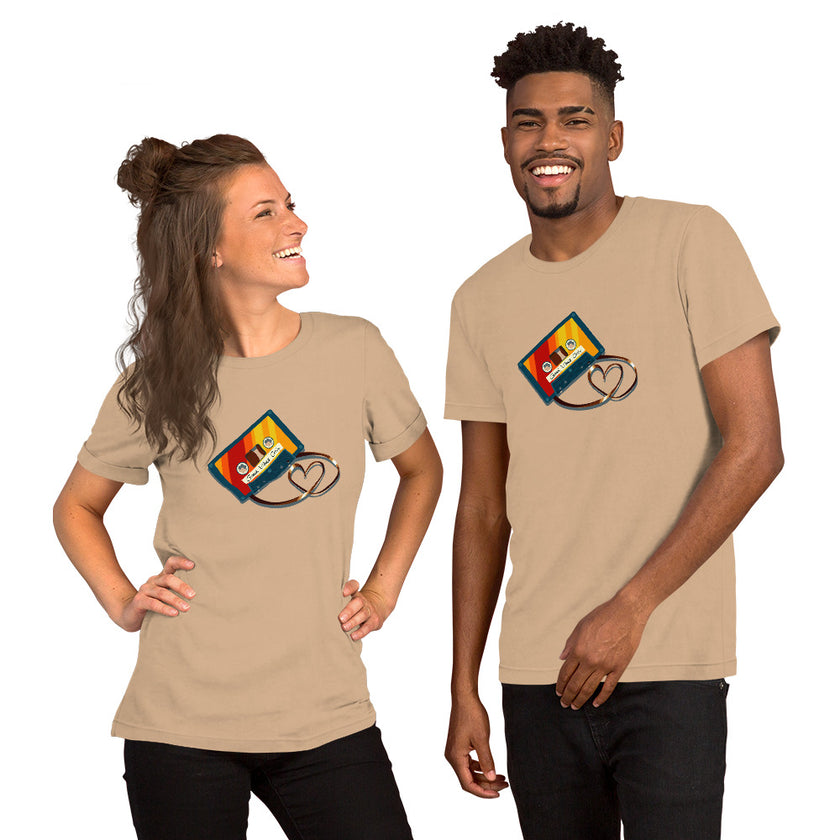 Model mockup of a beige tee with a bold retro cassette design and heart‑shaped tape loop