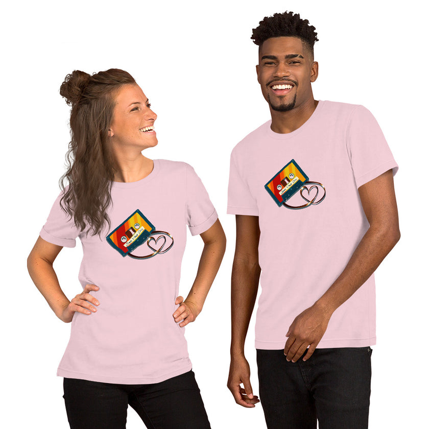 Model mockup of a light pink tee with a bold vintage cassette and heart‑shaped tape loop